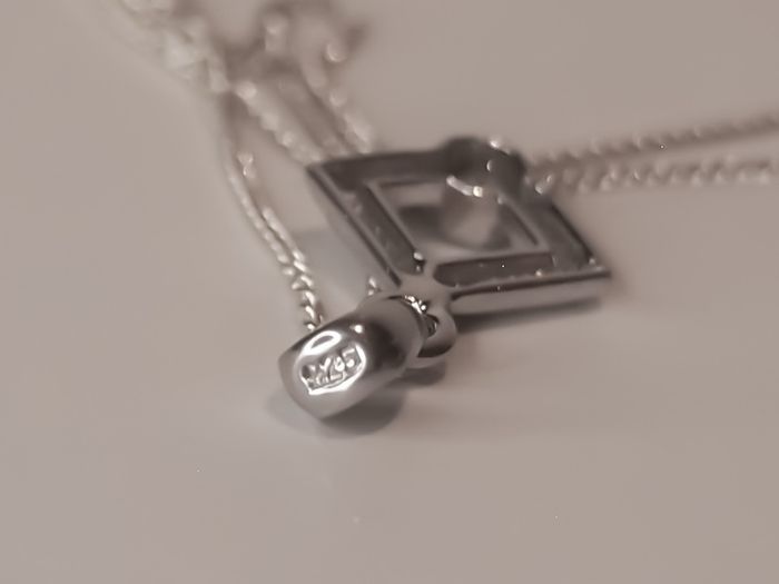 Sterling silver square pendant with a cz stone