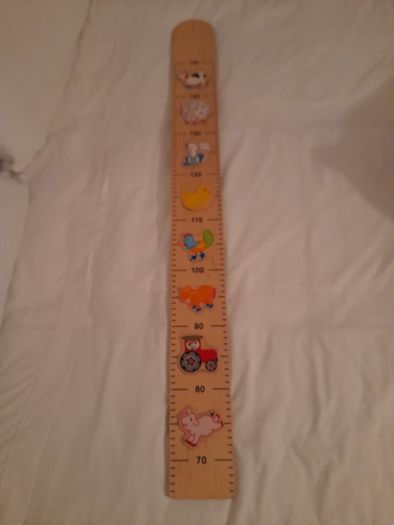 Wooden height rule/chart