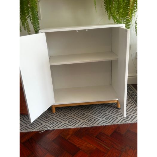 White IKEA cupboard on legs
