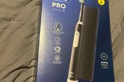 Oral b pro 1 braun electric toothbrush with travel case