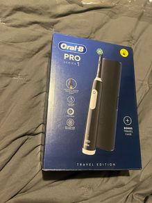 Oral b pro 1 braun electric toothbrush with travel case