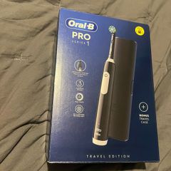 Oral b pro 1 braun electric toothbrush with travel case