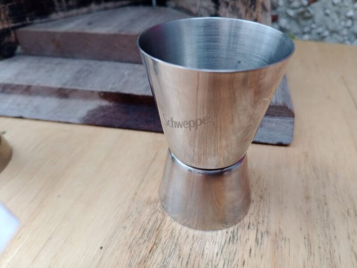 Schweppes, spirit measure, jigger, cocktail measure