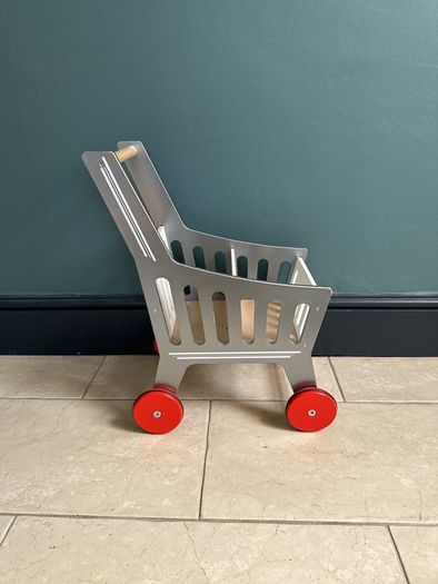 Kids wooden shopping trolley