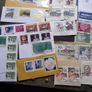 A small box with collection of stamps from overseas. Image 9