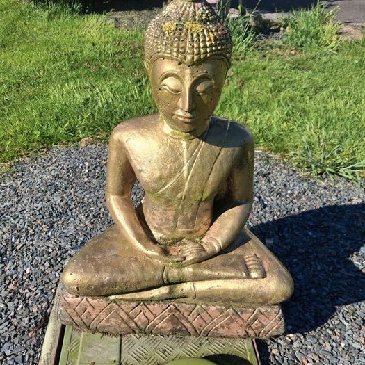 3 stone garden ornaments as seen