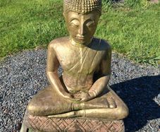 3 stone garden ornaments as seen