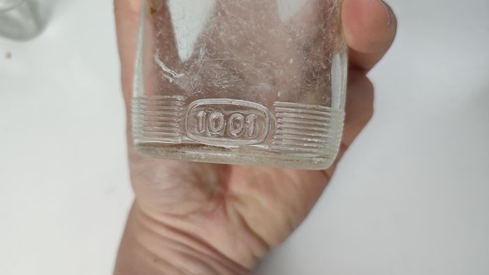 294 - Set of 7 Vintage Clear Glass Decorative Collectible Display Household Bottles