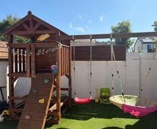 Gorgeous swing set with tree house