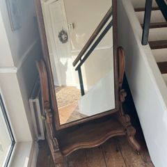 Victorian mahogany cheval mirror. c. 1880. Brass castors.