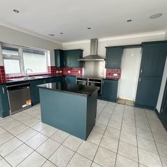 Solid oak shaker kitchen painted in railings