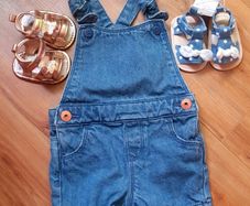 baby dungarees and sandals