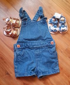 baby dungarees and sandals