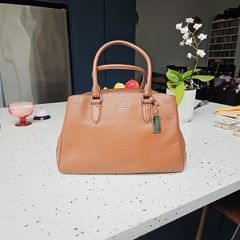 Genuine Coach brown leather ladies handbag.