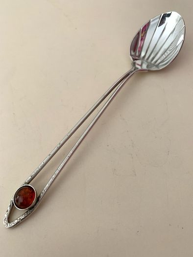 Antique coffee spoon with amber