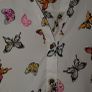 White shirt with multi coloured butterfly detail Image 4