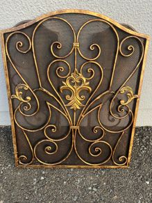 Ornate antique brass fire guard