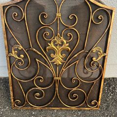 Ornate antique brass fire guard