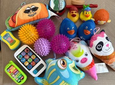 baby toys selection, balls, teddies, toy phones, ducks