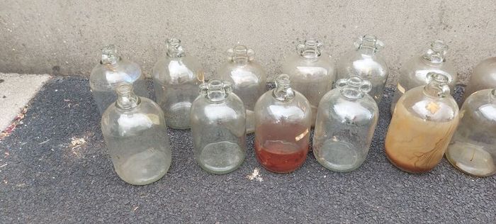 13 x demi johns,glass jars ,used condition, needs a clean,,buyer collects,,10 euros each or a deal  for the 13 ,sold as is