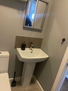 Bathroom sink with tap