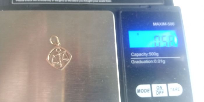 375 9ct gold zodiac Libra pendant