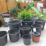 Bundle of various garden planter pots. Image 7