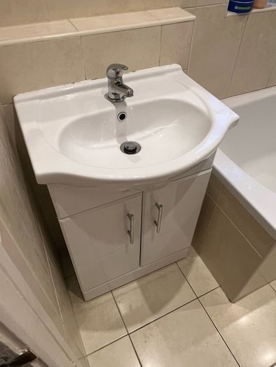 Bathroom vanity sink unit with storage