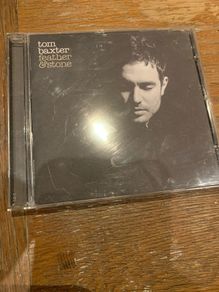 Tom Baxter - feather & stone