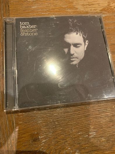 Tom Baxter - feather & stone