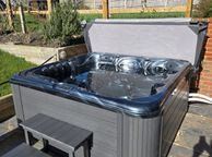 main image for ad Massive Sale for the month of March on this massive spec hot tub