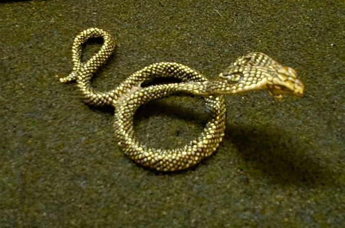 3 brass snakes.