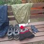 2 golf bags and various  club also jackets balls and tees shoes  and a trolly Image 9