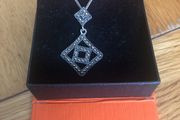silver pendent and chain