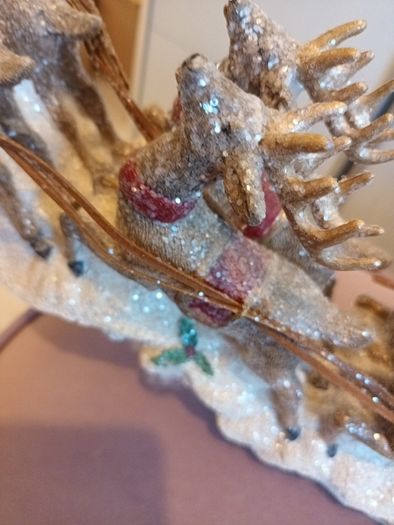Long santa in sleigh christmas decoration
