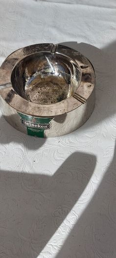 Heineken metal ashtray ,used condition, still nice condition ,buyer collects or pays postage thank you, sold as is,