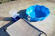 Dog raised bed and paddling pool