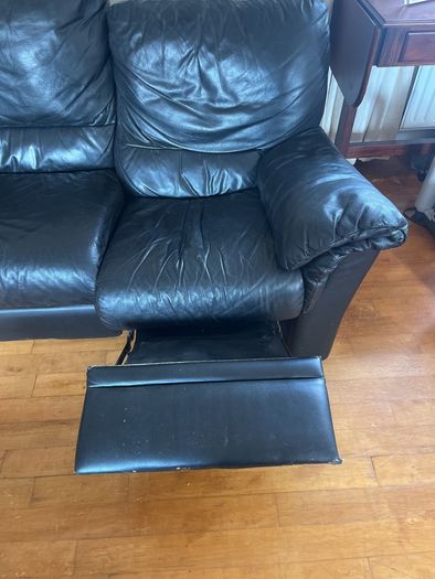 Black leather sofa. Good condition, just needs a bit of a clean