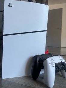 PlayStation Slim with 2 controllers