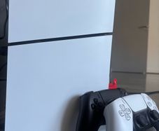 PlayStation Slim with 2 controllers