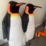 Two large penguins and dinosaur Image 3