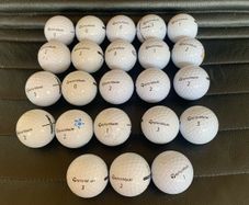 (23) TaylorMade Distance golf balls