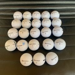 (23) TaylorMade Distance golf balls