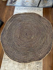 Round woven straw rug