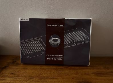 Kitchen sink splash guard