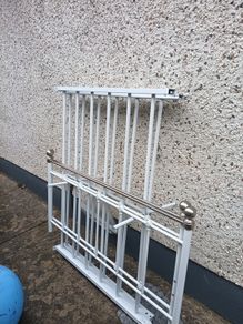 White metal double bed frame