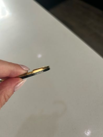 Calvin Klein black and gold bangle