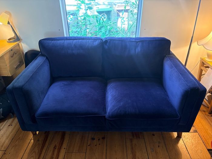 Two seater couch in navy velvet for sale
