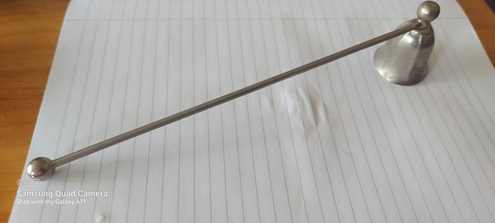 Candle metal snuffer ,,good patina for its age ,sold as seen