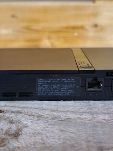 playstation 2 slim scph-70003 in original box with manuals